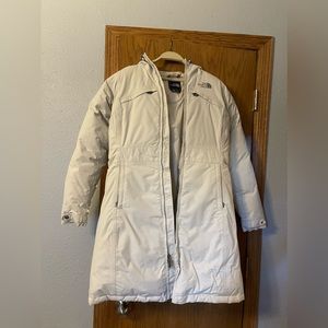 Cream colored North Face Arctic parka.